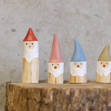 Tiny wooden Santa set of 4